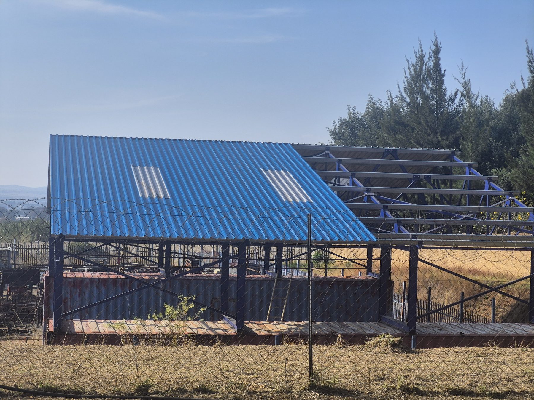 Roof sheeting with translucent light panels