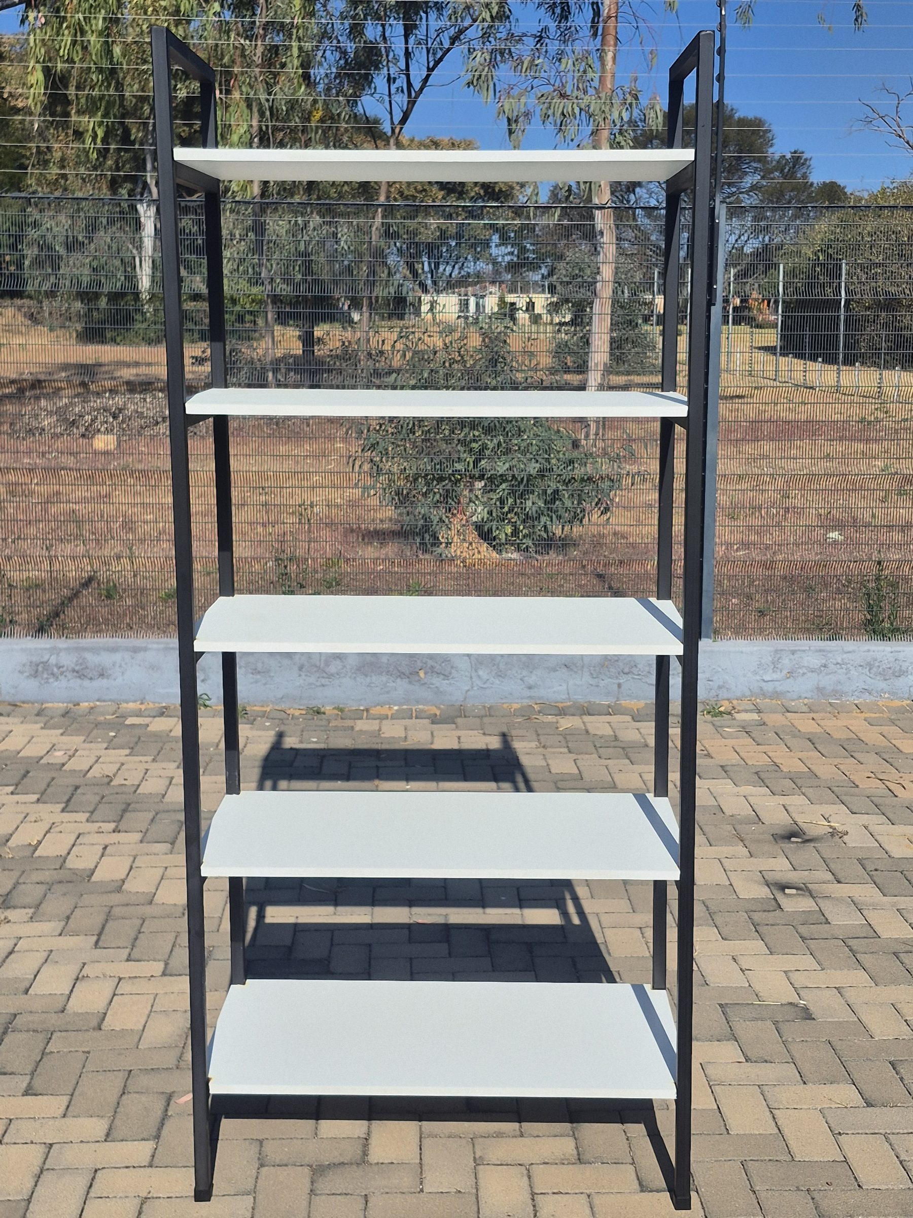 A black steel shelving unit